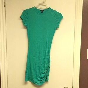 Form fitting teal dress